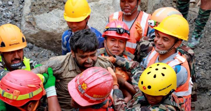 2 trapped workers rescued from tunnel 9 days after Nepal floods