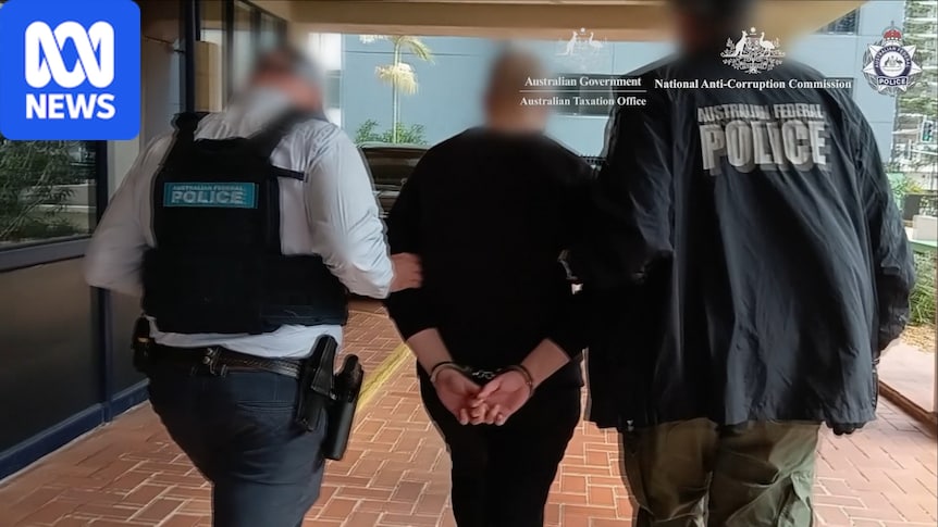 ATO employee charged over alleged disclosure of information to organised crime groups