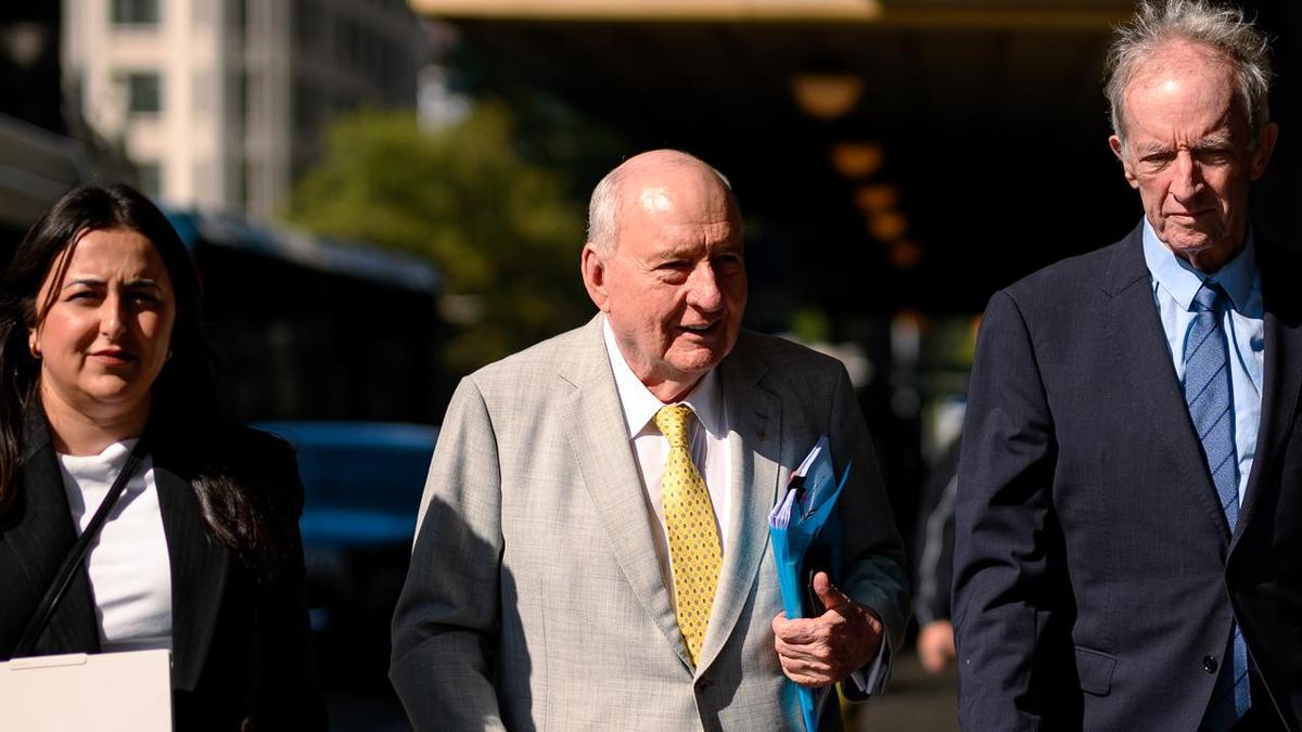 Alan Jones comes face to face with his alleged victim