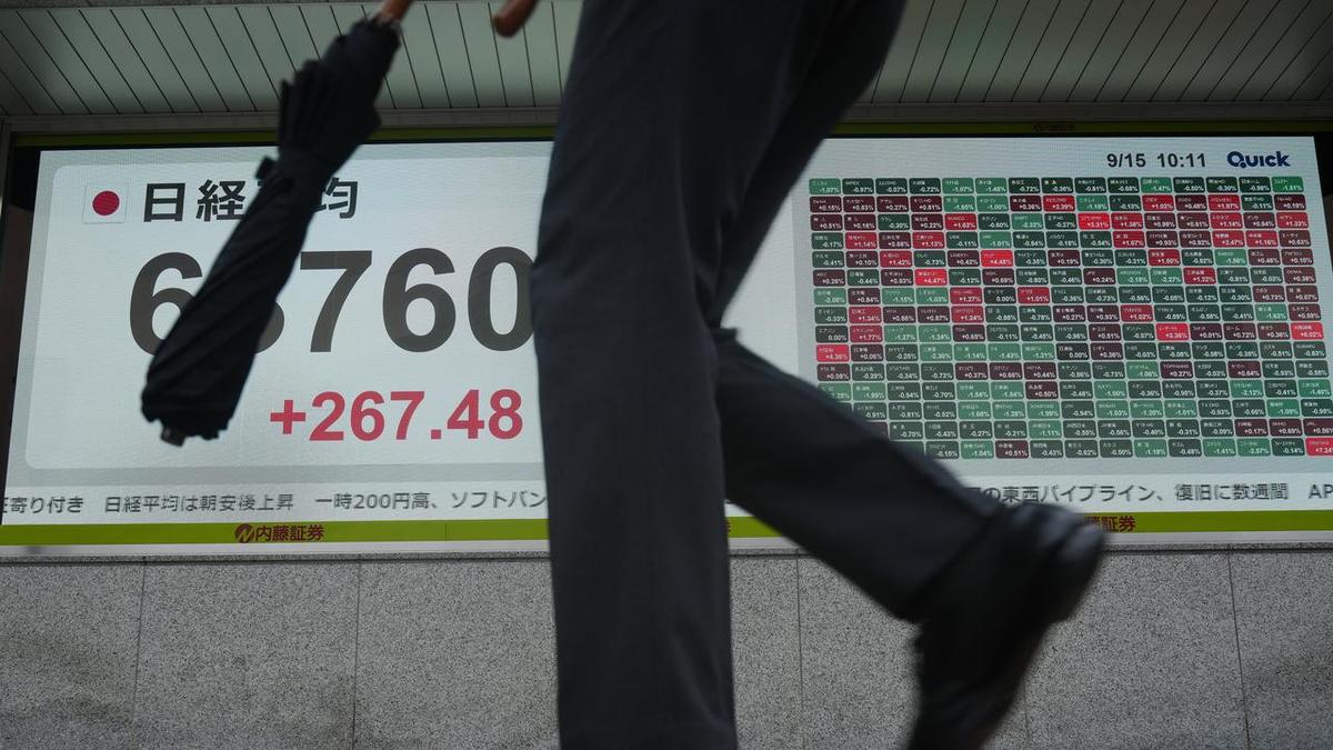 Asian shares waver as oil and yields rise