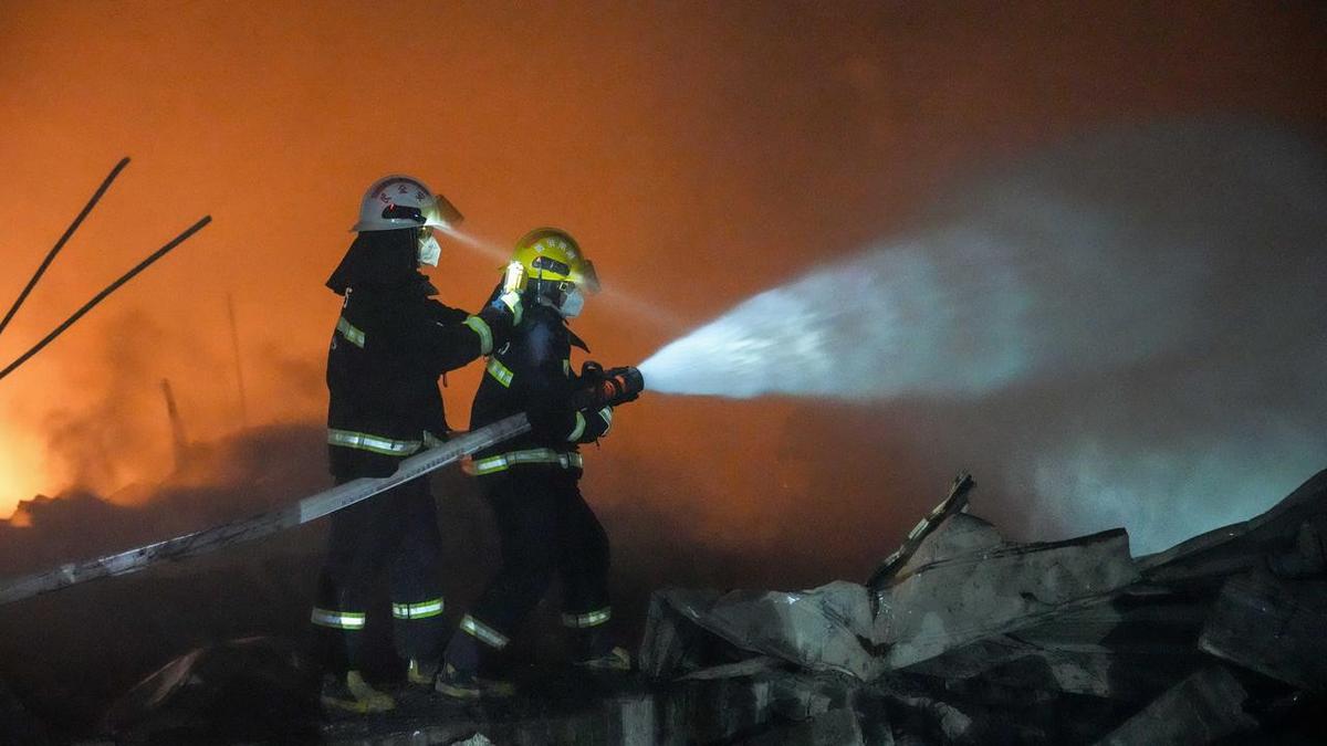 At least 20 killed in cargo ship fire at China shipyard