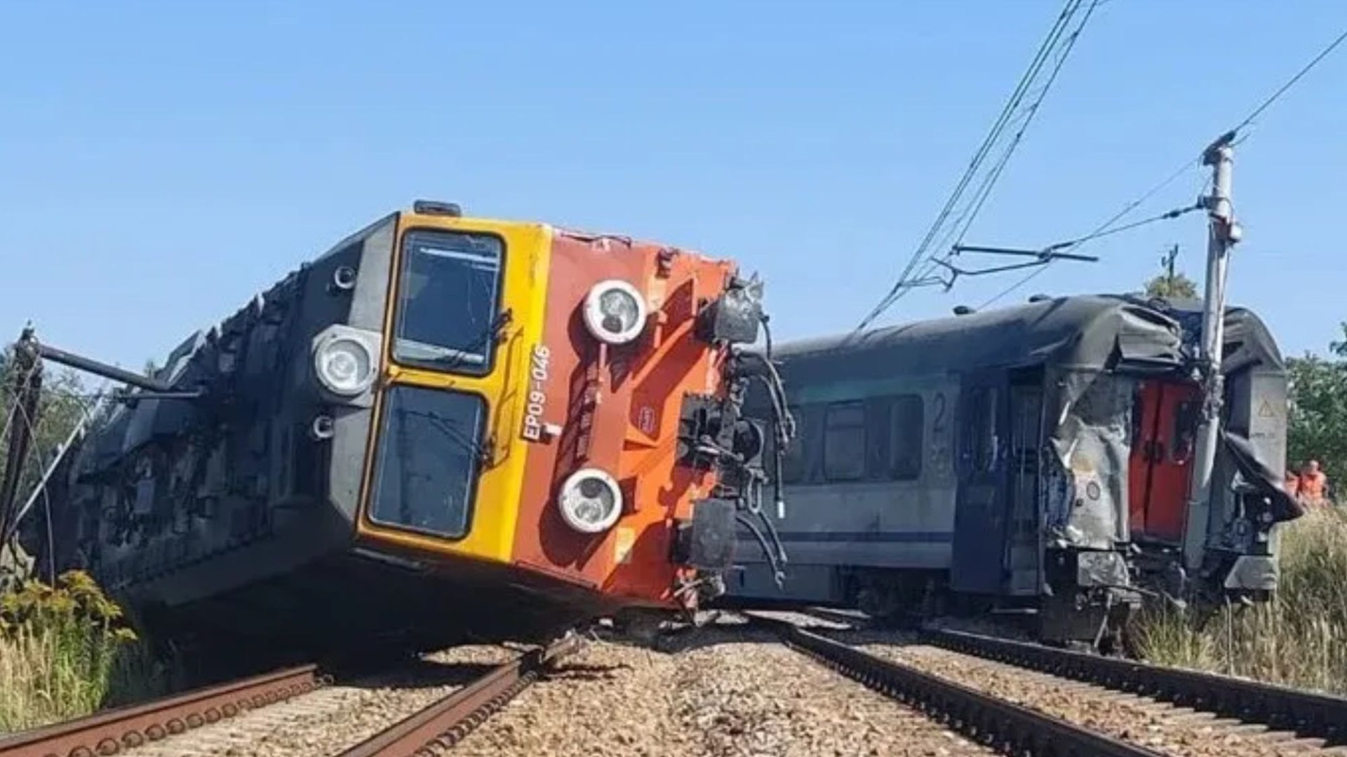 At least 20 passengers injured as train derails after smashing into delivery truck on level crossing in Poland