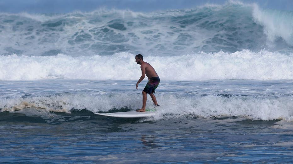 Australian surfer risked his life to save fellow surfer who had been attacked by a shark