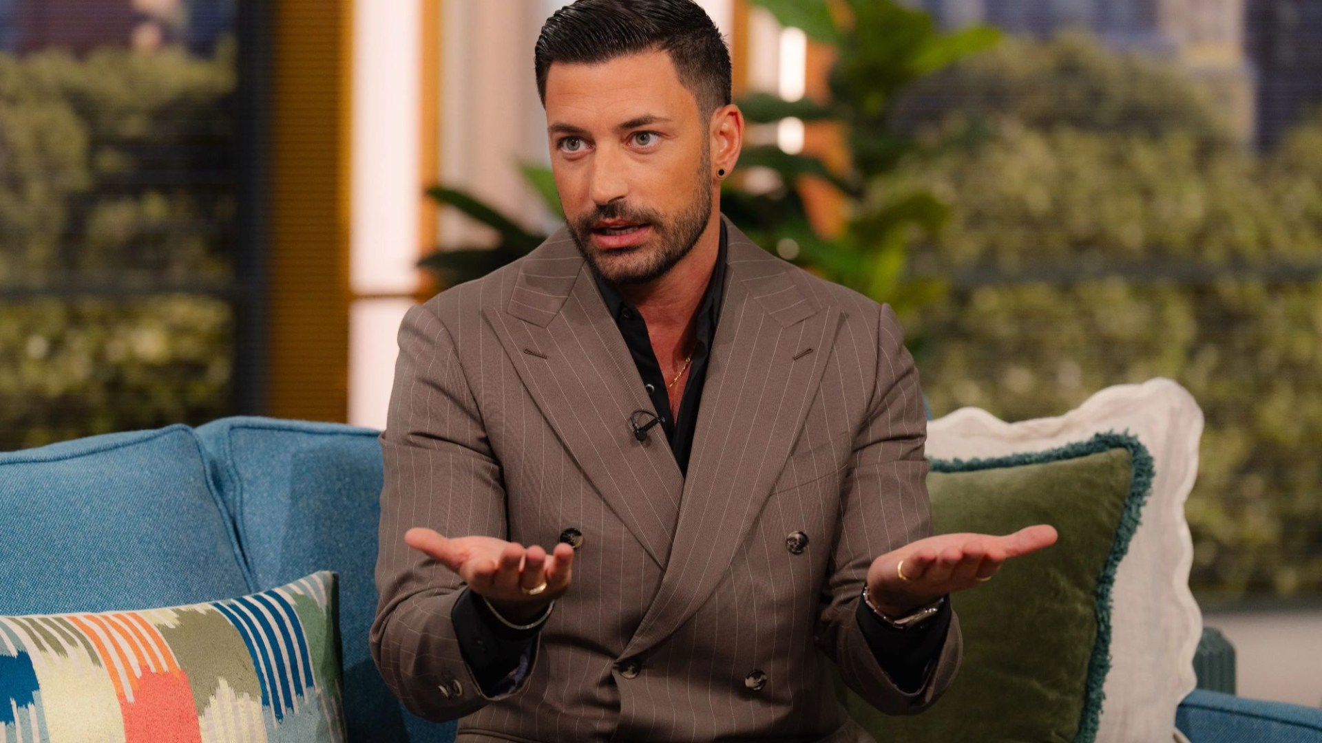 Awkward moment Giovanni Pernice sniggers at Amanda Abbington scandal and clashes with This Morning hosts over ordeal