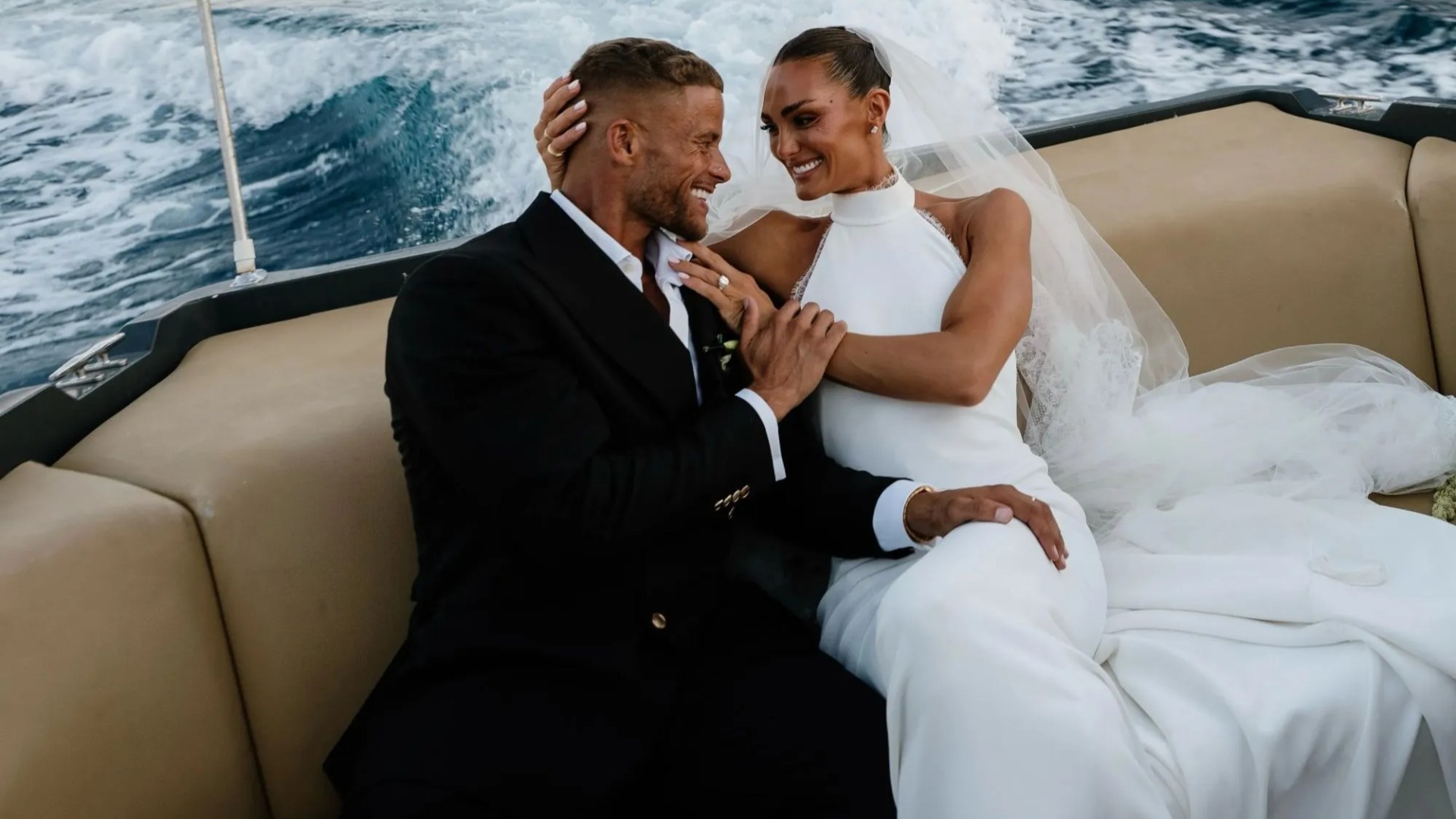 Axed Gladiators star Comet marries husband for a second time in lavish Greek wedding as she arrives by boat