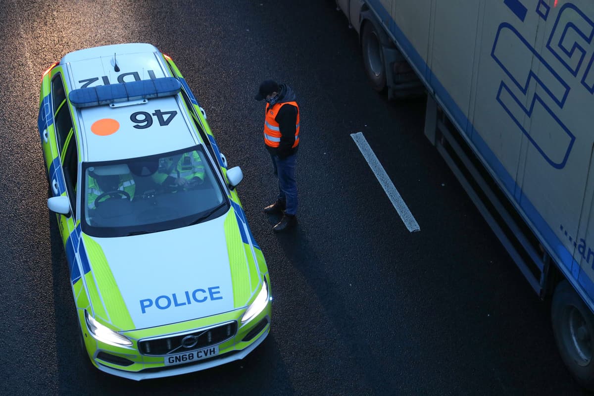 Black-clad masked ‘stop the boats’ protesters block roads in Dover