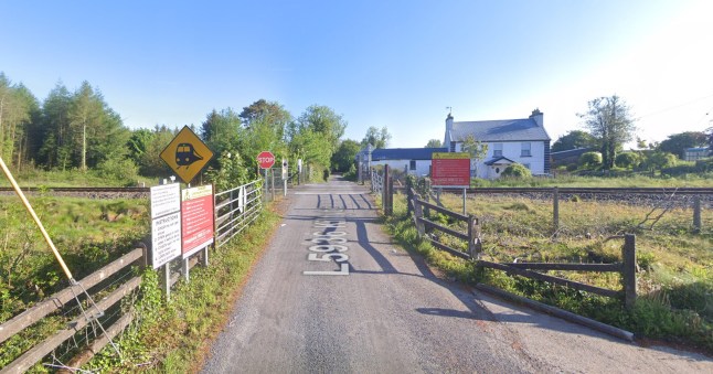 Boy, 12, dies and dad injured after train crashes into car at level crossing