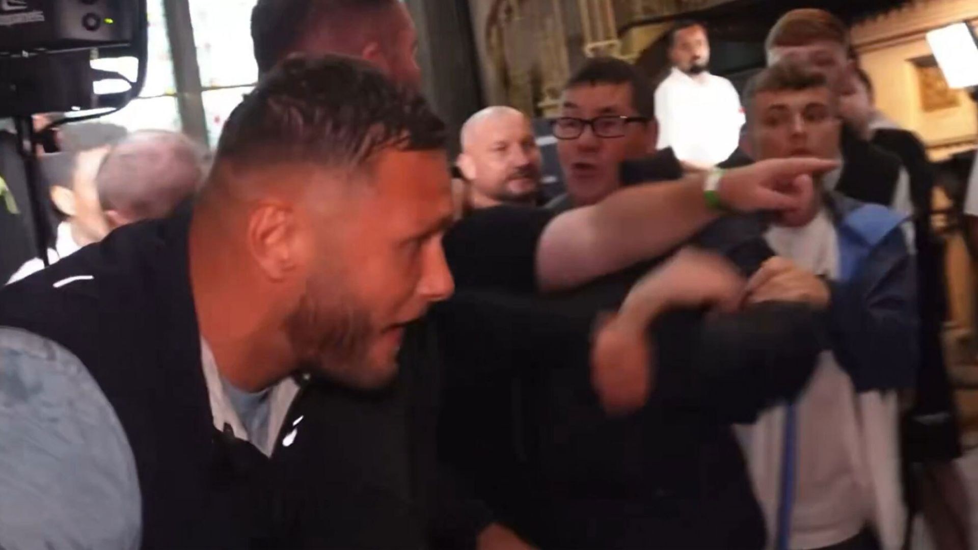 Britain’s ‘Hardest Man’ sucker-punched and left with cut lip AGAIN as Misfits Boxing media day descends into chaos