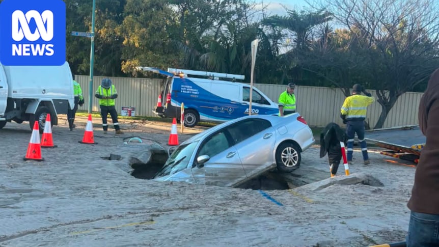 Car plunges into suburban sinkhole in Perth's south