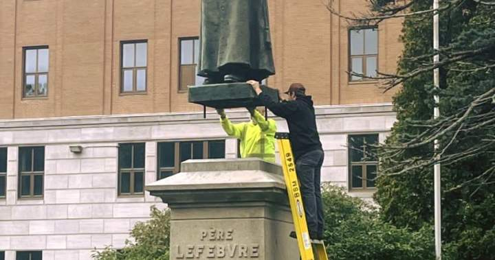 Century-old statue returned to its base in Memramcook, N.B. after vandalism