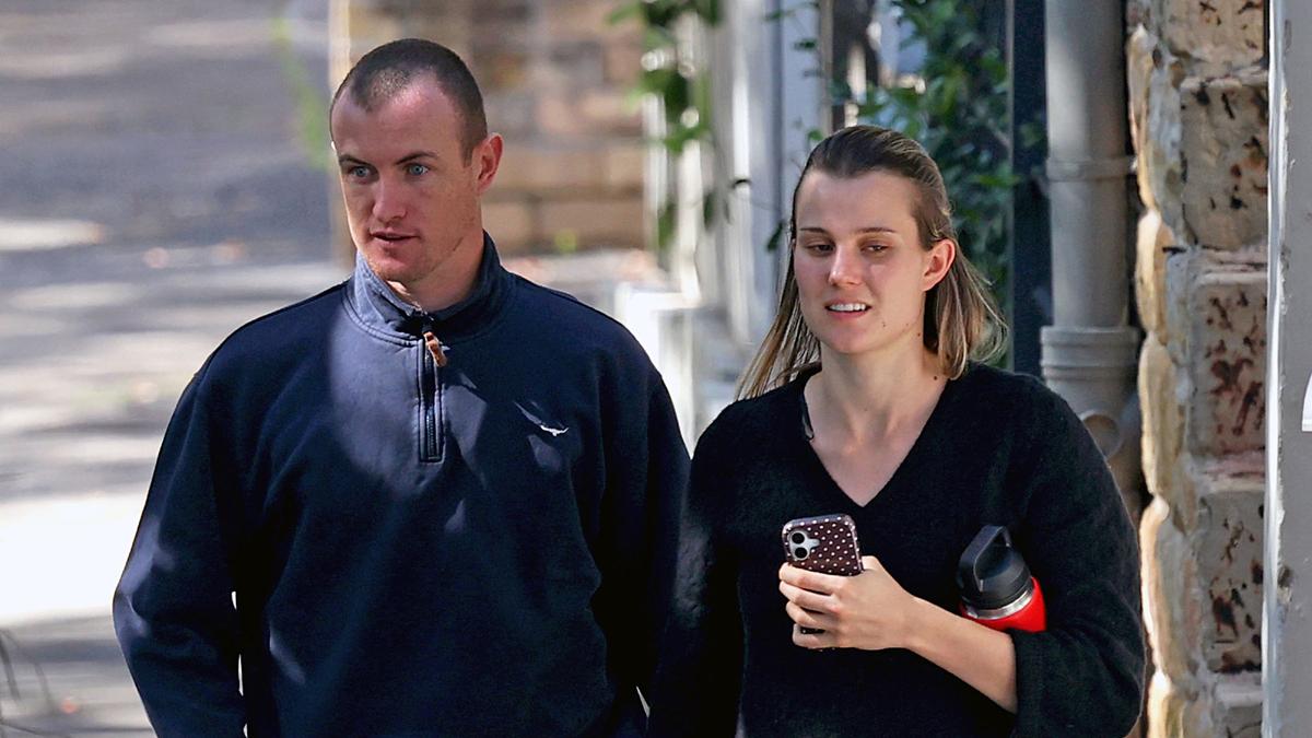 Chad Warner makes first public appearance as suspended Sydney Swan spotted with partner Alice Hughes