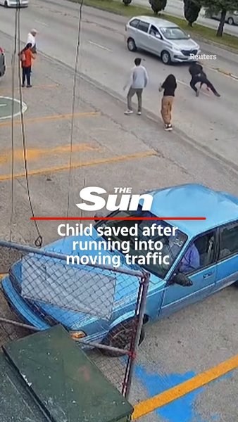 Child saved after running into moving traffic