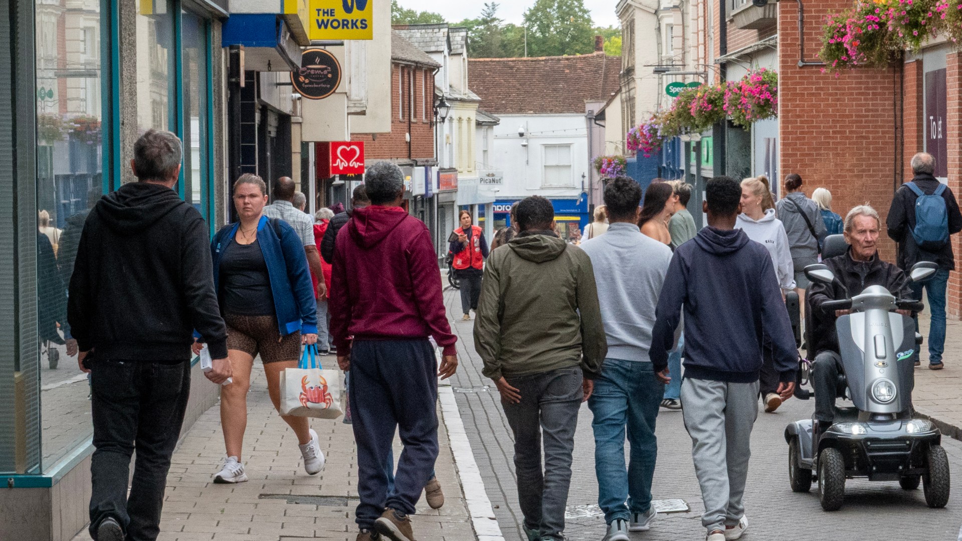 Council deploys security guards to patrol town centres over ‘gatherings of male migrants’ near asylum centre