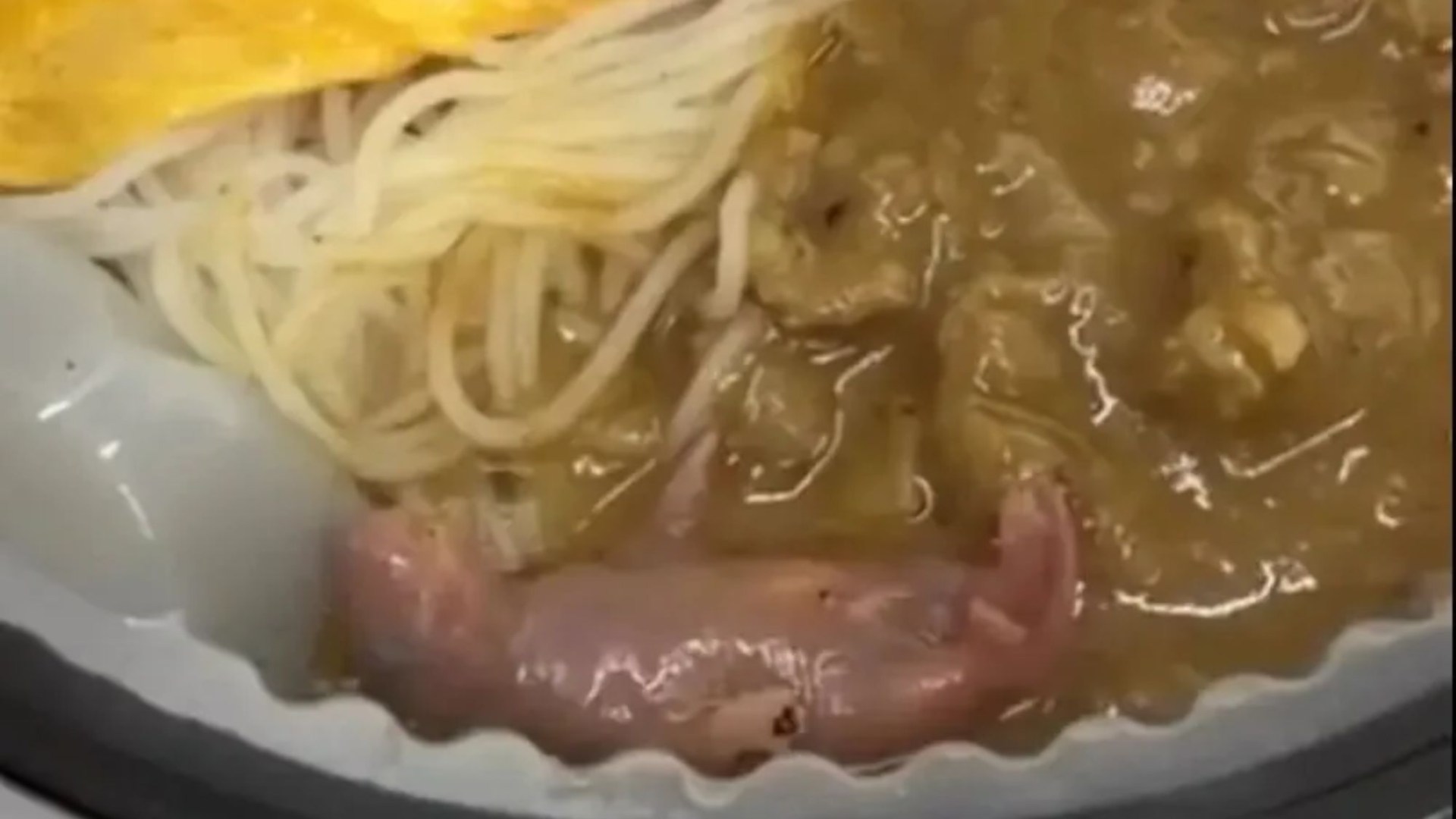 Disgusting moment newborn RAT is found wiggling in sauce of beef takeaway by horrified customer