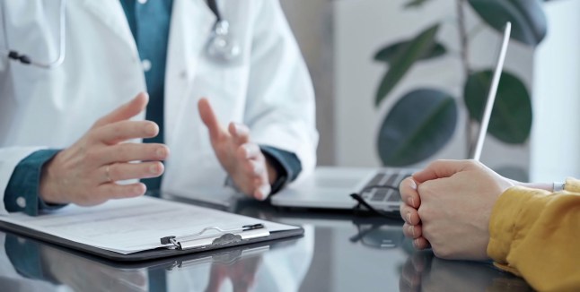 Doctor breached data rules in phone call during patient exam