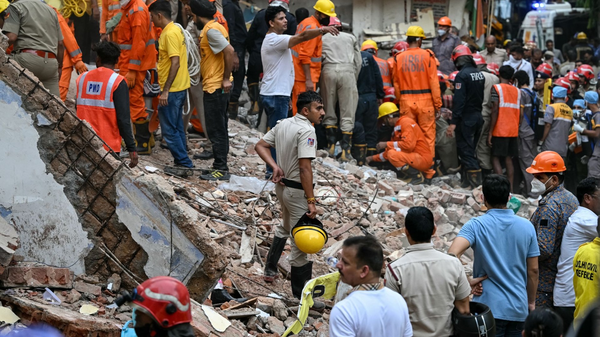 Dozens of students trapped inside five-storey hostel after building collapsed with 3 found dead and 8 seriously injured