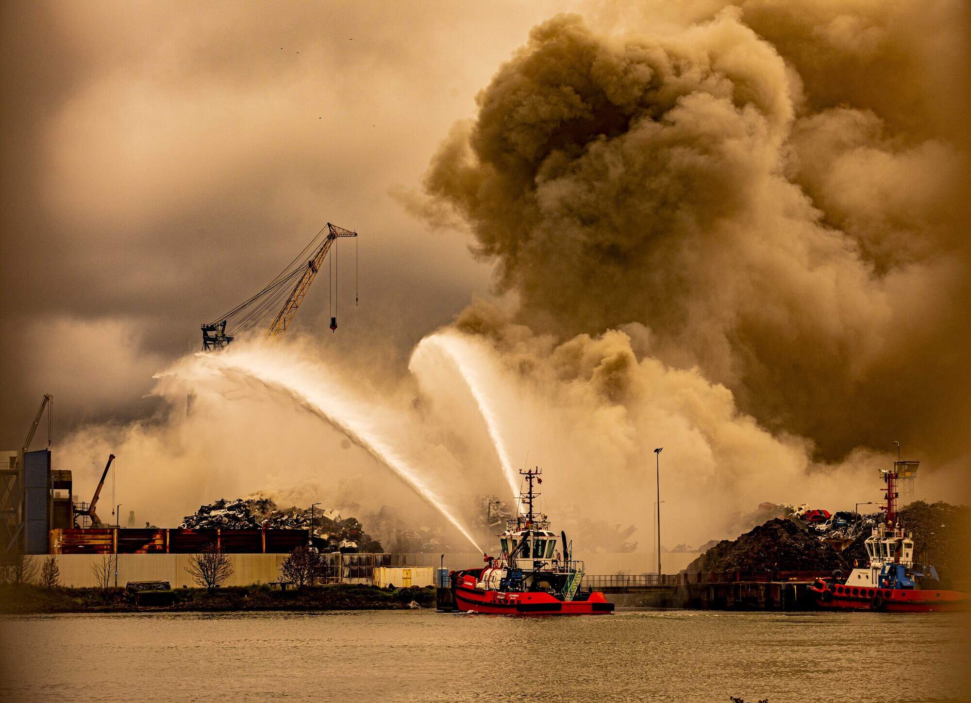 Emergency services tackling major fire at Belfast docks ‘involving a quantity of cars’