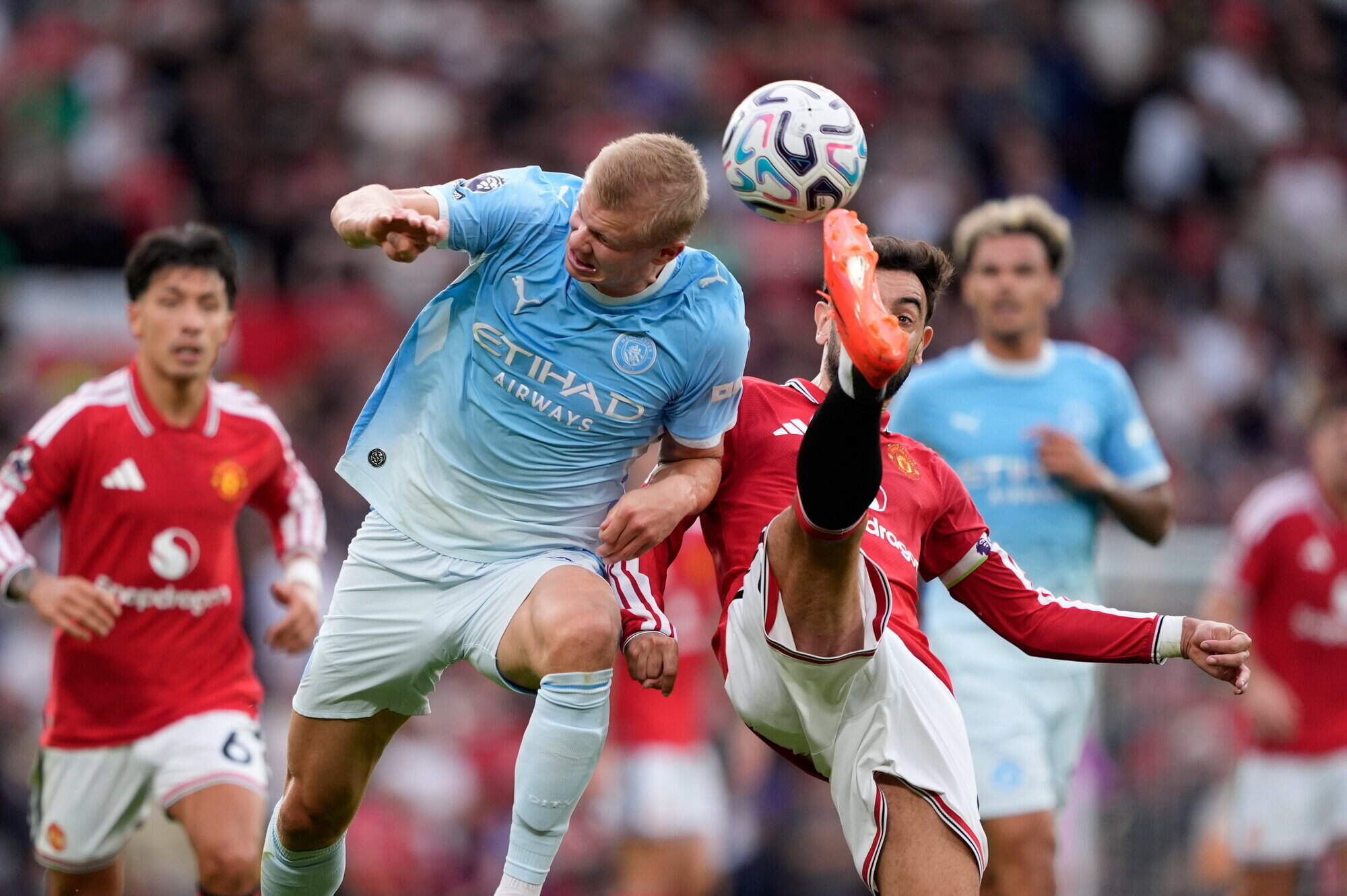 Erling Haaland earns 10-man Manchester City victory in fiery Old Trafford clash