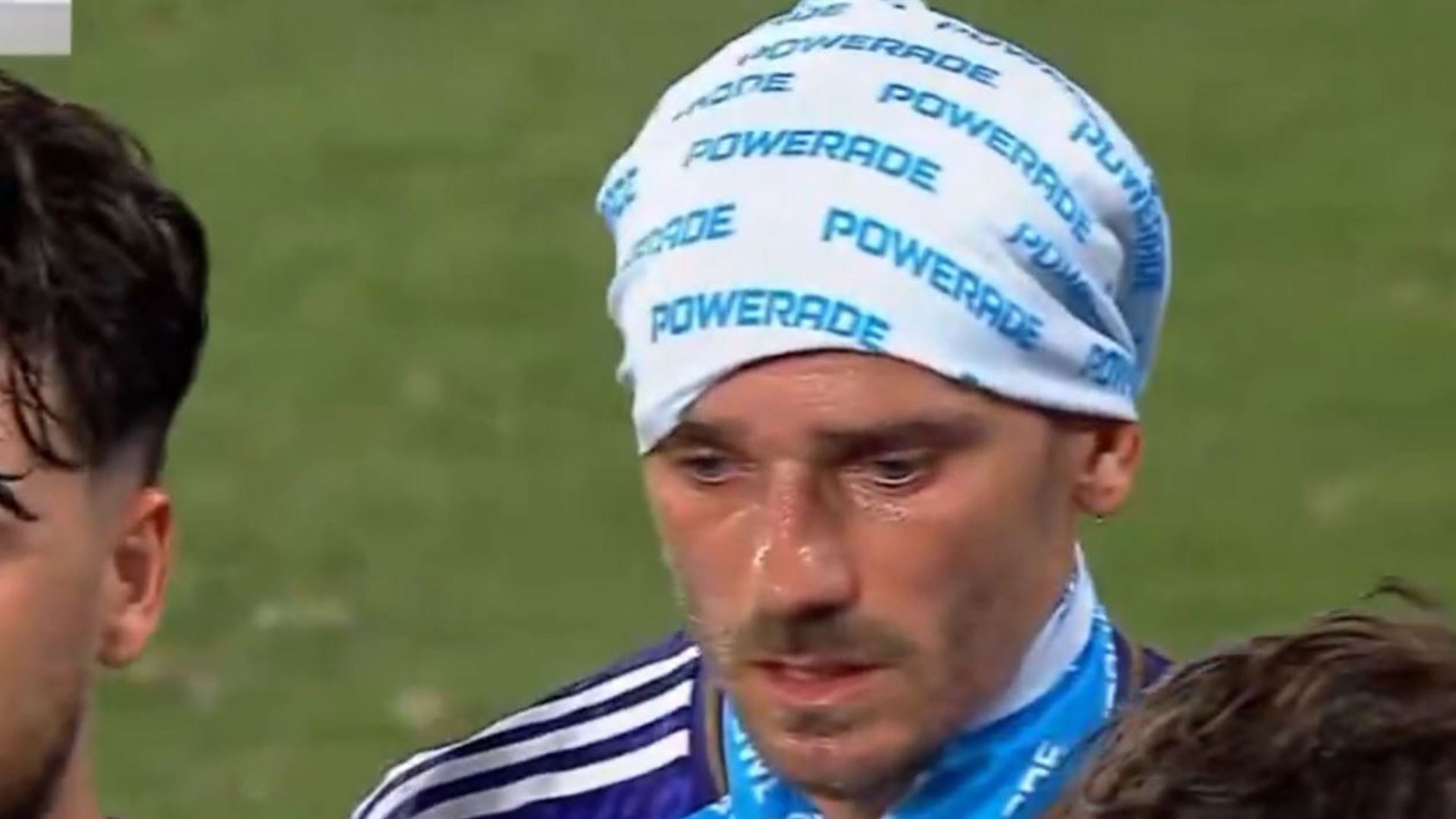 Fans joke Antoine Griezmann is ‘fighting for his life’ as he wears damp towel on his head just 33 minutes into match