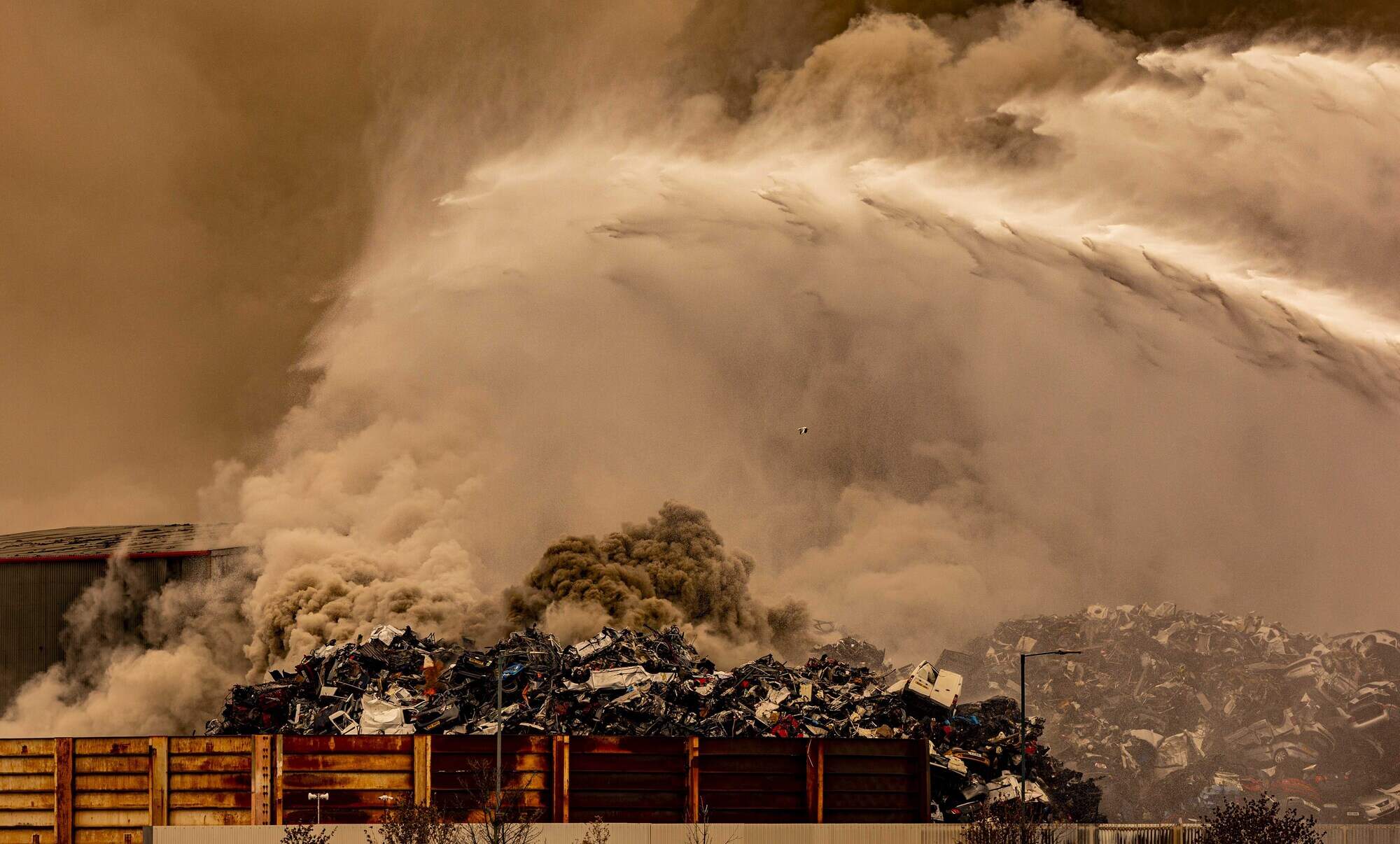 Firefighters battle ‘well-developed’ Belfast docks blaze involving ‘4,500 tonnes of scrap cars’