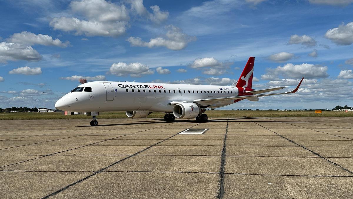 First of QantasLink Embraer E190 touching down in Perth as FIFO fleet renewal advances, bringing new comfort