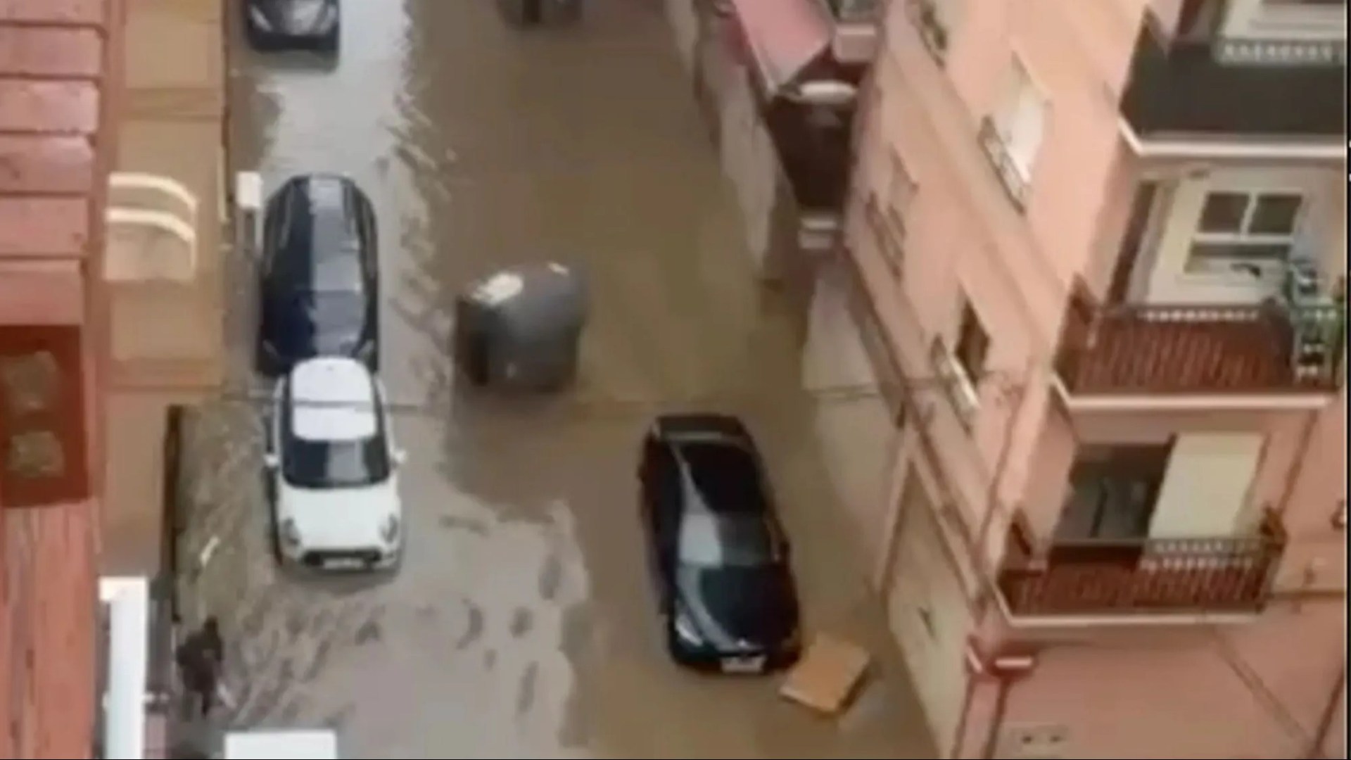 Flash floods wreak havoc in Spanish holiday hotspots as torrential rain turns roads into rivers after woman, 67, killed