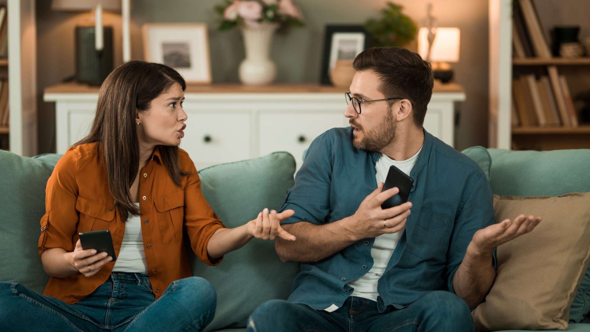 Having fewer meaningful conversations & preferring to scroll phones are key signs a relationship is fading, poll finds