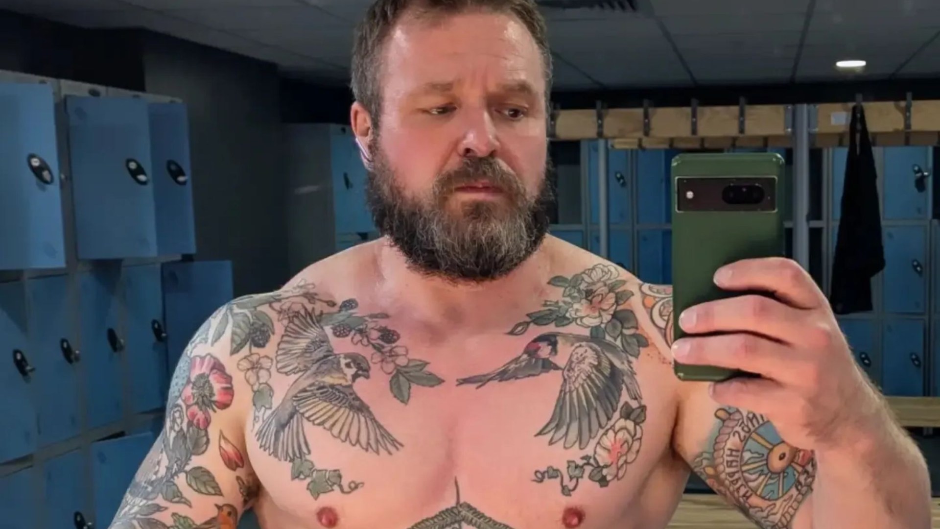 Holby City star unrecognisable as he shows off HUGE muscles, massive tattoos and furry beard 24 years after BBC show