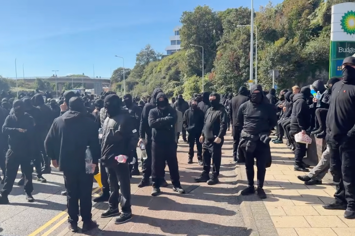 Home secretary orders police to take stronger action on protesters wearing balaclavas as forces brace for more unrest