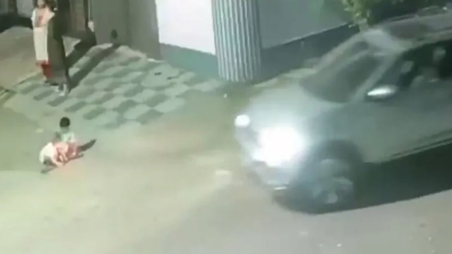 Horrifying moment girl, 2, playing with sister is crushed to death by car as mum chatted to pal nearby