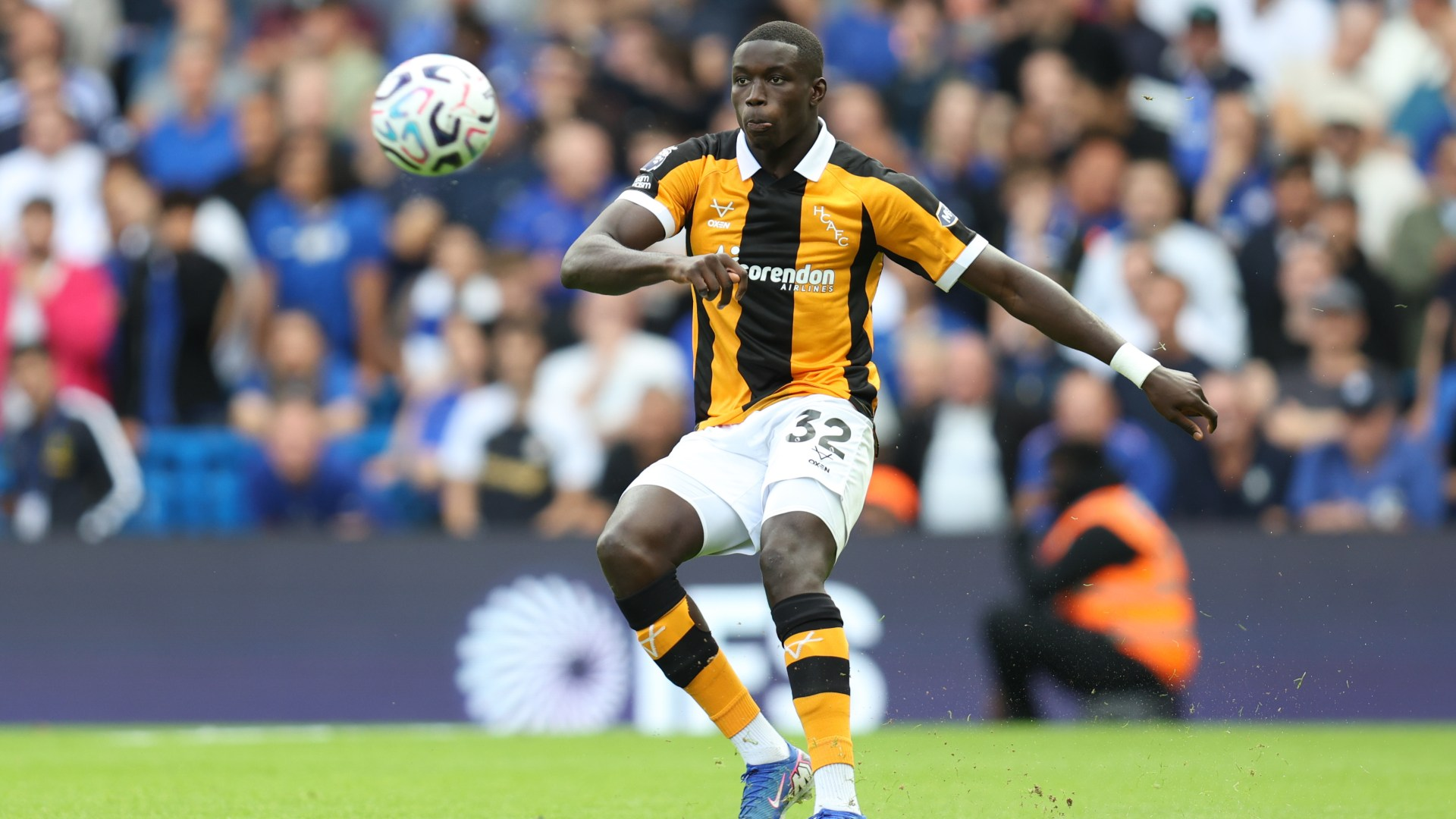 Hull star Nobel Mendy needs urgent medical attention and helped off pitch vs Chelsea after nasty clash of heads
