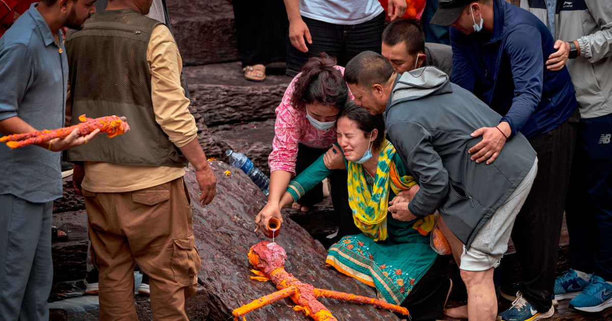 In Nepal, mourners hold symbolic cremation for missing loved ones