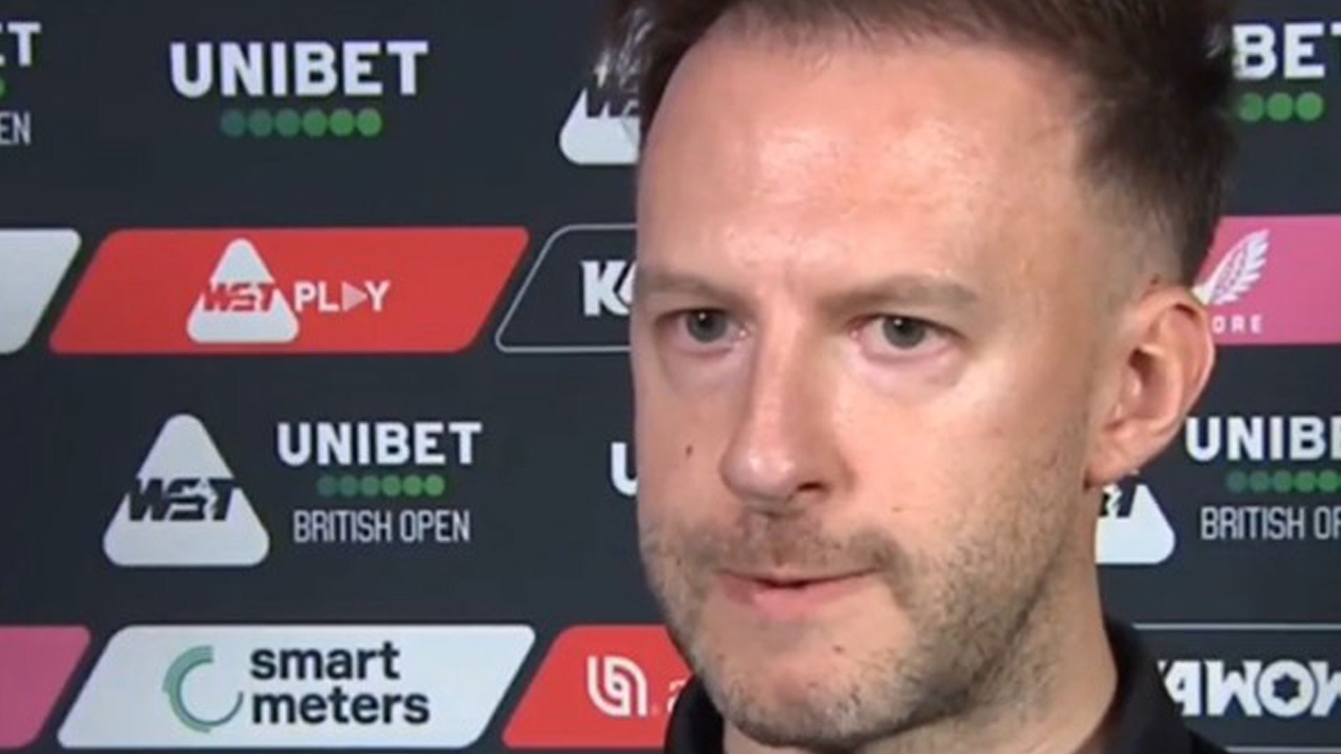 Judd Trump snaps at TV reporter in curt interview after British Open horror show