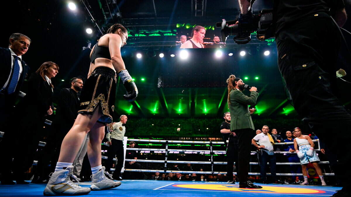 Katie Taylor v Flora Pili: Irish boxing legend gets final pro fight underway at sold-out Croke Park