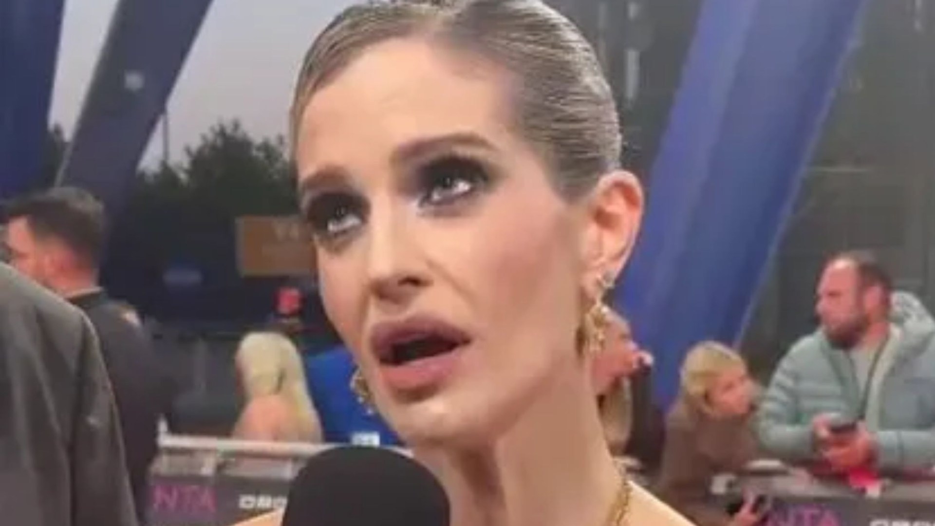 Kelly Osbourne says she ‘doesn’t agree’ with mum Sharon’s backing of Tommy Robinson but admits ‘it’s hard, I love her’