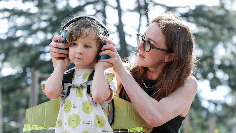 Kids under five can go to the footy free. So why do parents have to buy them a ticket for a gig?