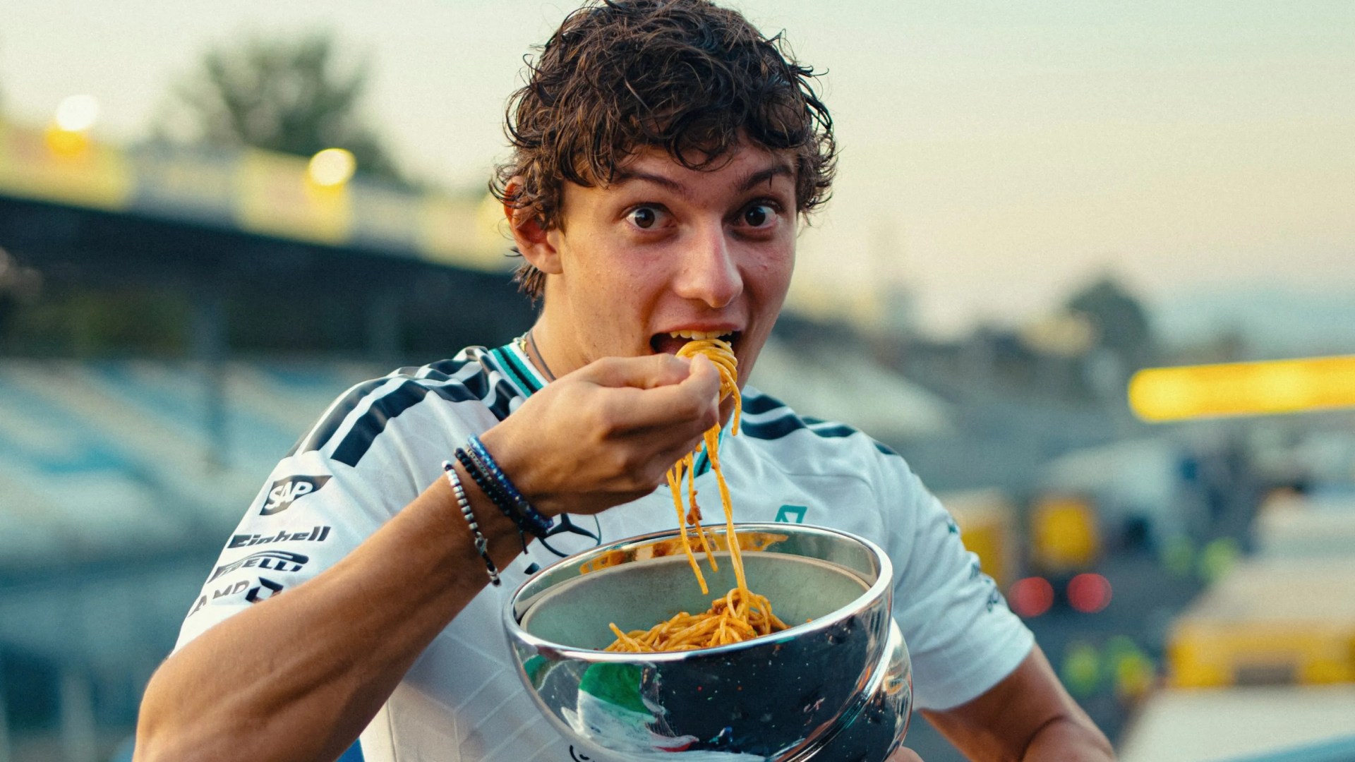 Kimi Antonelli eats PASTA out of his Italian GP trophy after F1 star’s stunning comeback to win from 19th on grid