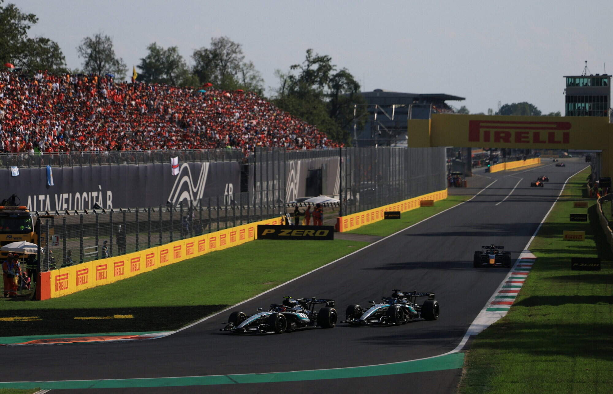 Kimi Antonelli reels in Mercedes team-mate George Russell to win Italian Grand Prix from back row of grid