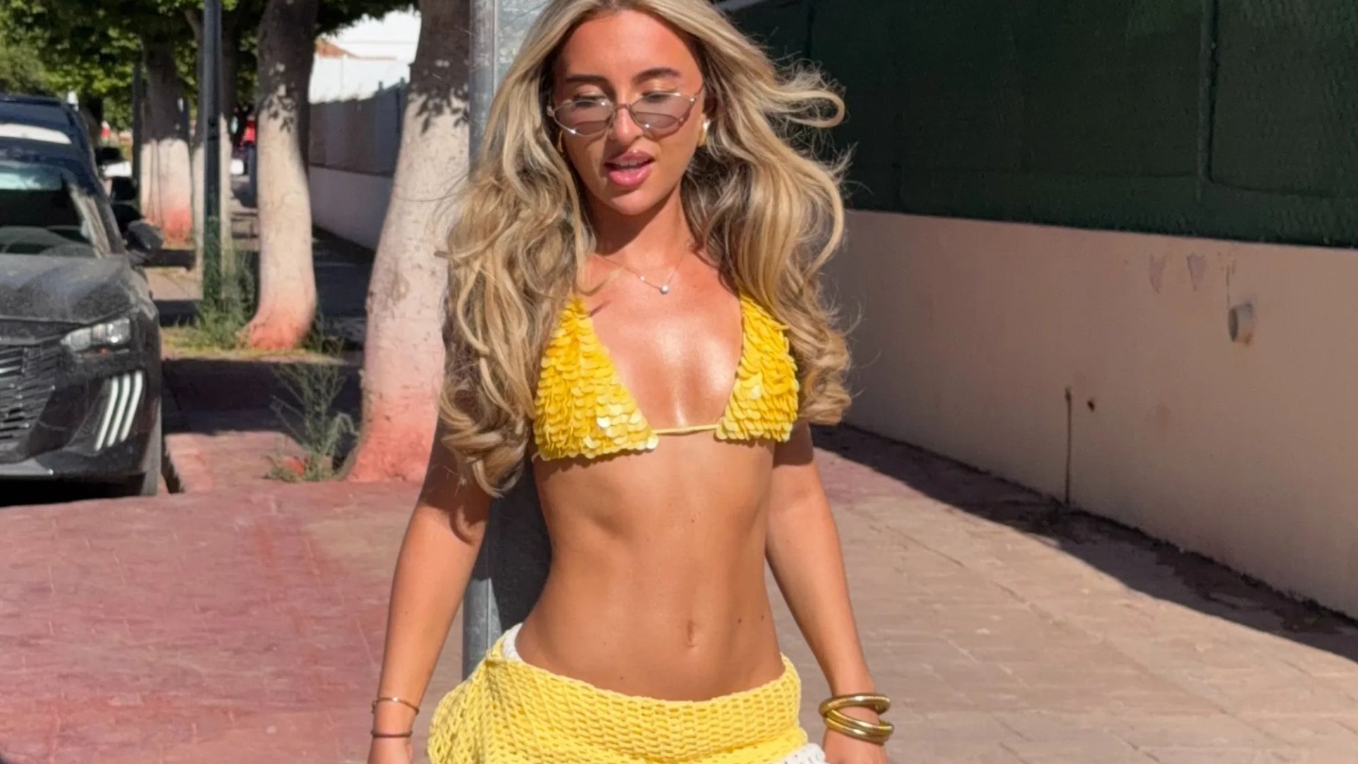 Love Island’s Yasmin flaunts impressive abs in yellow bikini top as she enjoys Ibiza holiday without partner Tommy