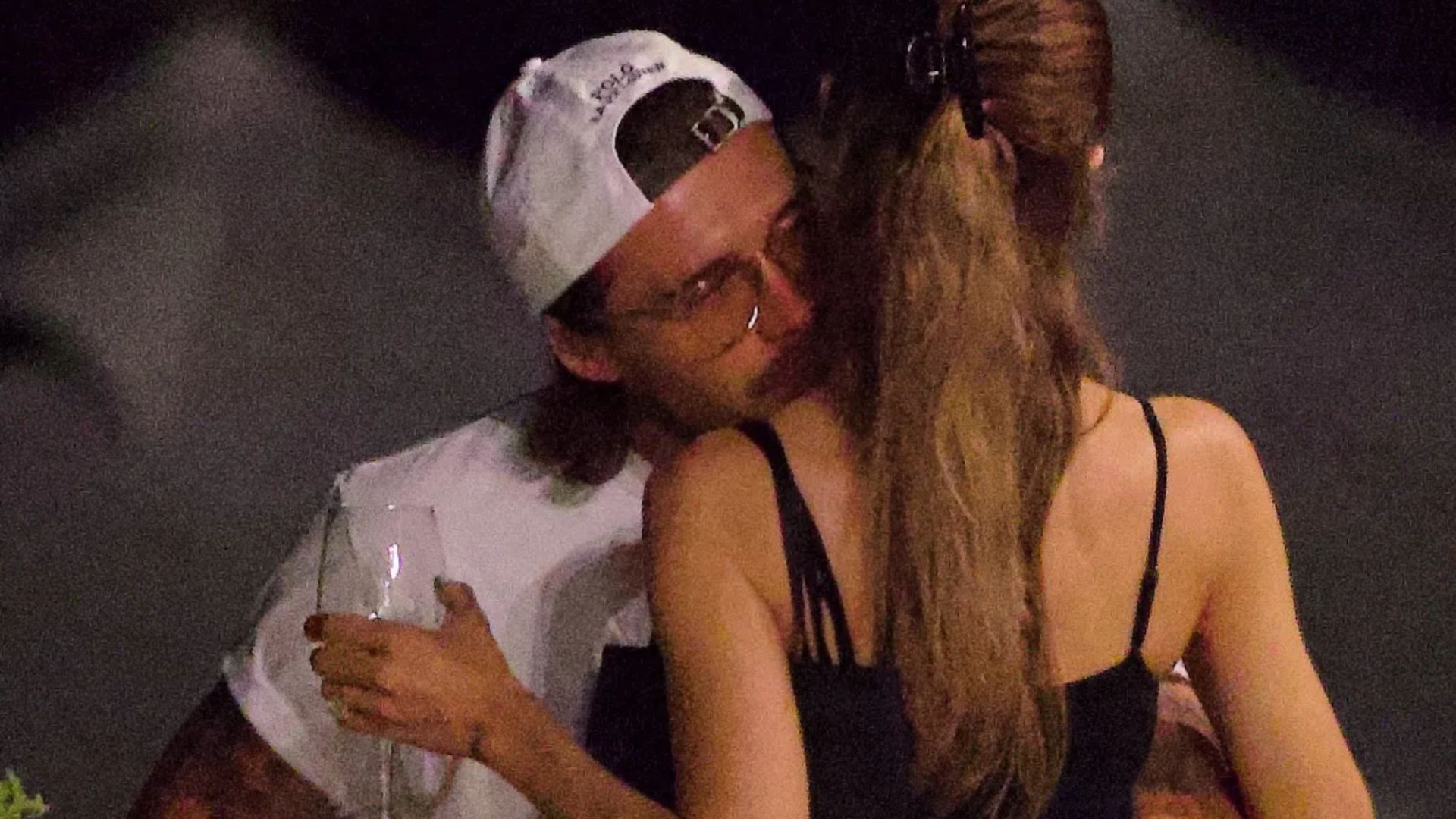 Loved-up Brooklyn Beckham grabs wife Nicola’s bum as they arrive in Venice for her Rising Star award