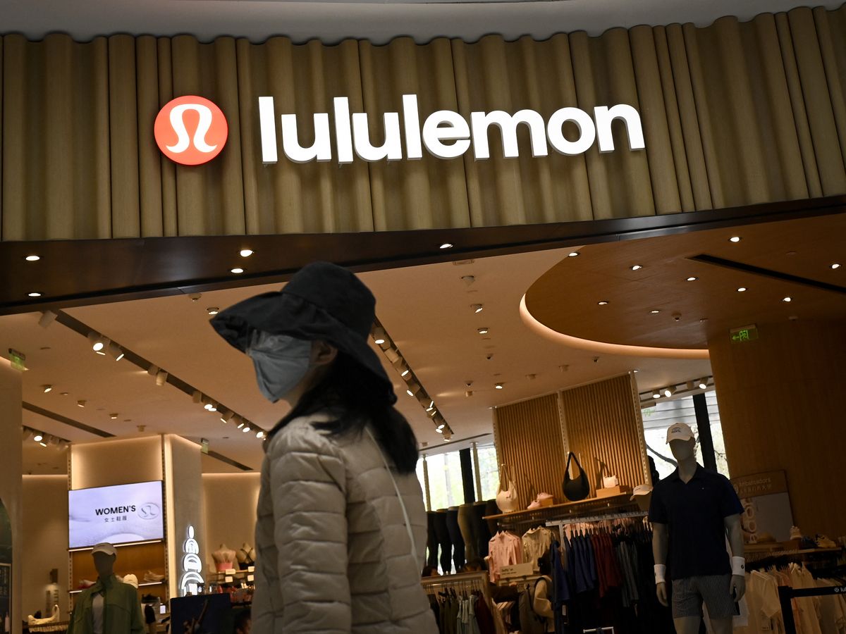 Lululemon reports drop in sales and revenue in second quarter, revises outlook