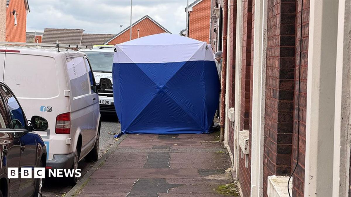 Man arrested on suspicion of murder after two people found dead at house