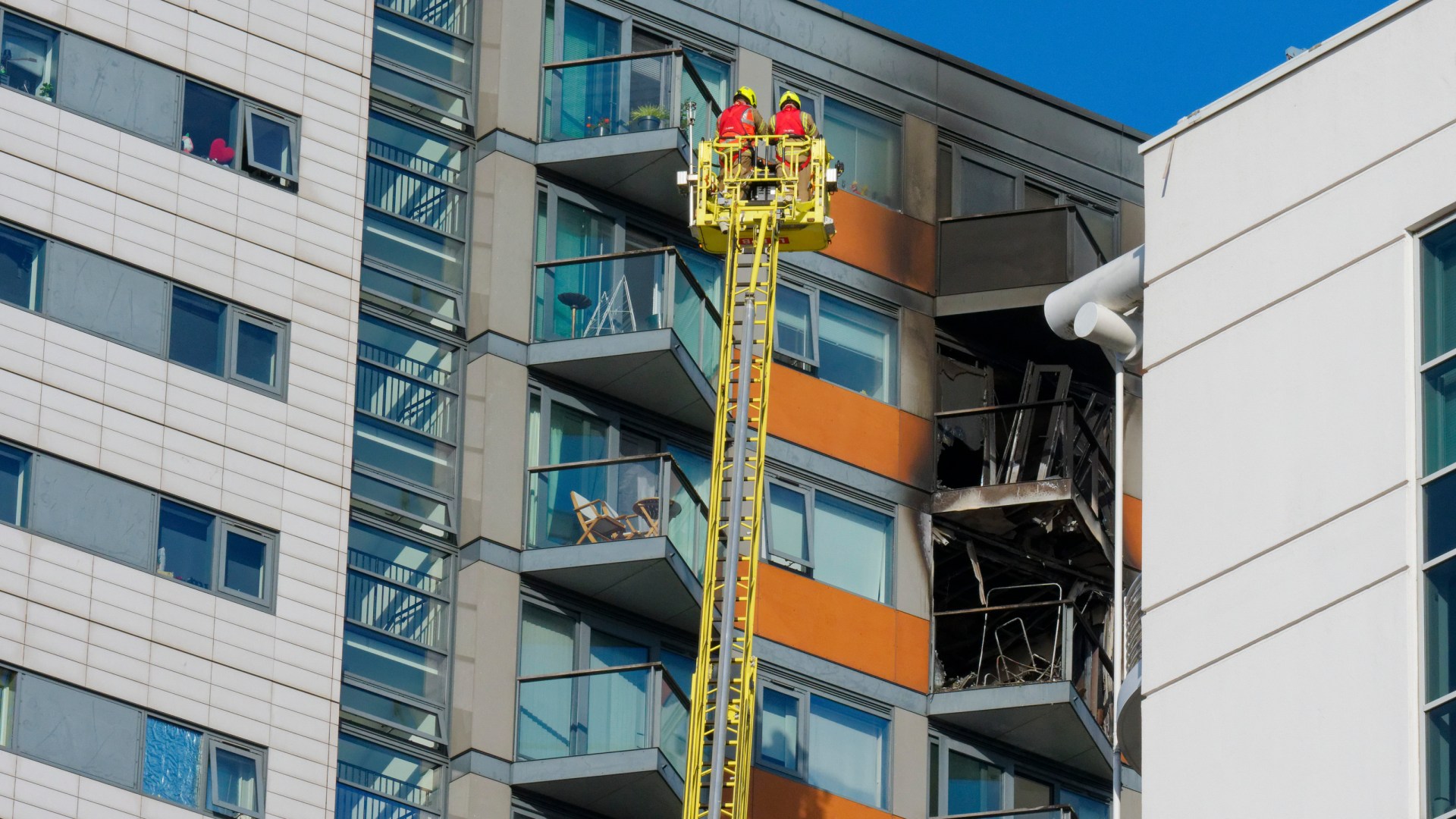 Man dies after 2-bed flat on 17th floor of tower block goes up in flames as woman and child flee blaze