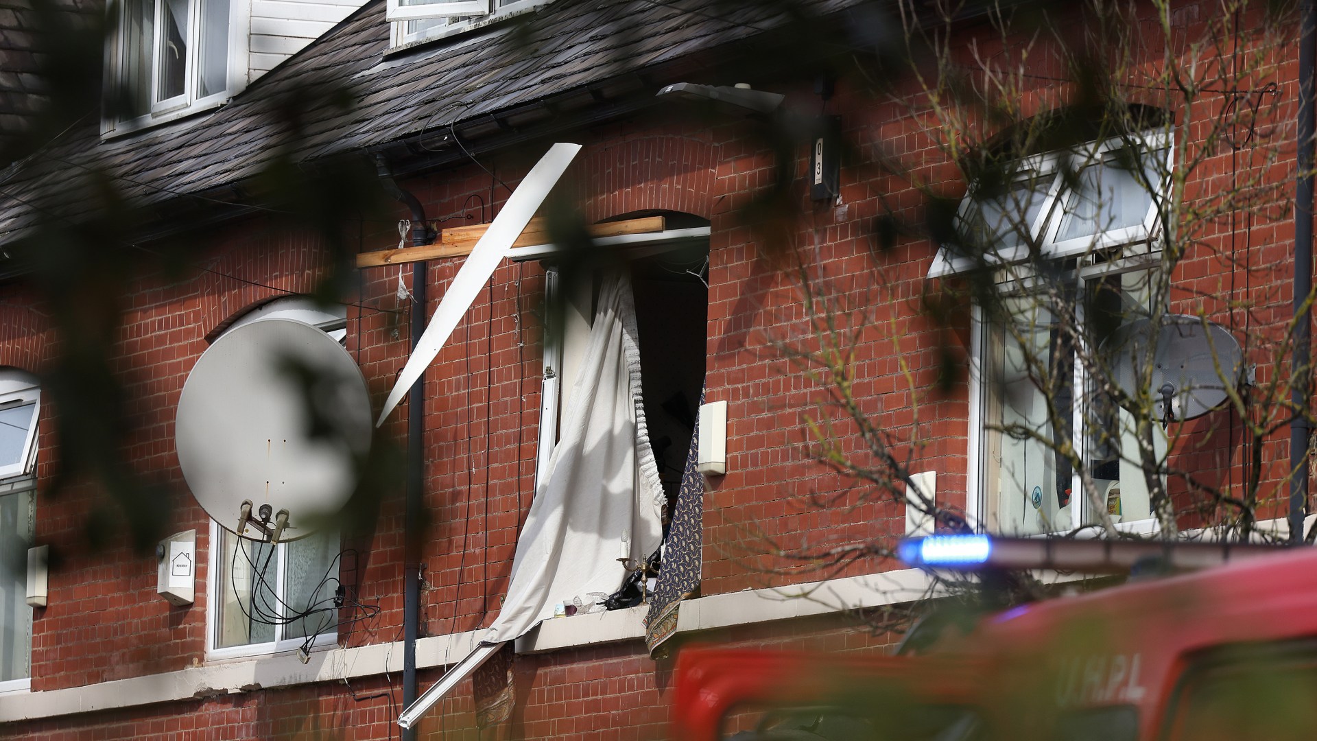 Man fighting for life and woman injured after house explosion blew out windows and neighbours evacuated