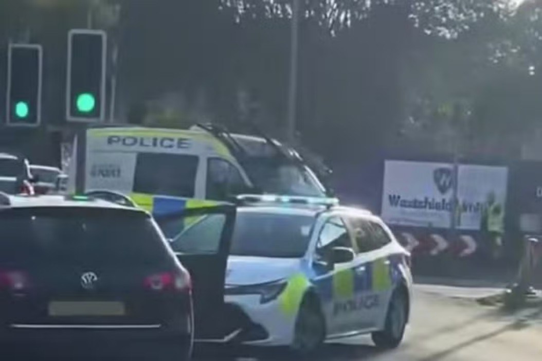 Man hit by car & teen dragged along road after driver ploughs into them during road rage row sparked by crash