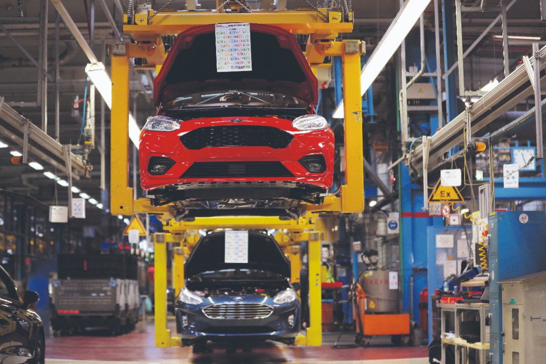 Manufacturing growth loses momentum as economic risks loom 