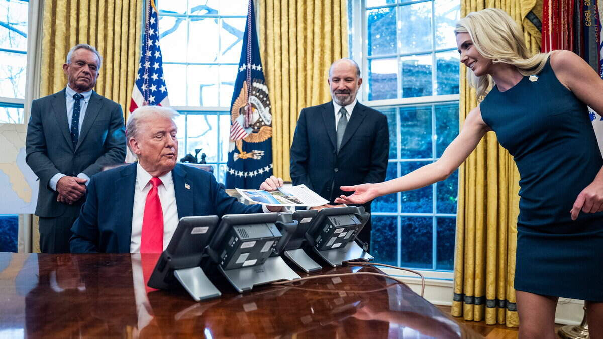 Melania Trump defends US president’s close relationship with ‘human printer’ Natalie Harp