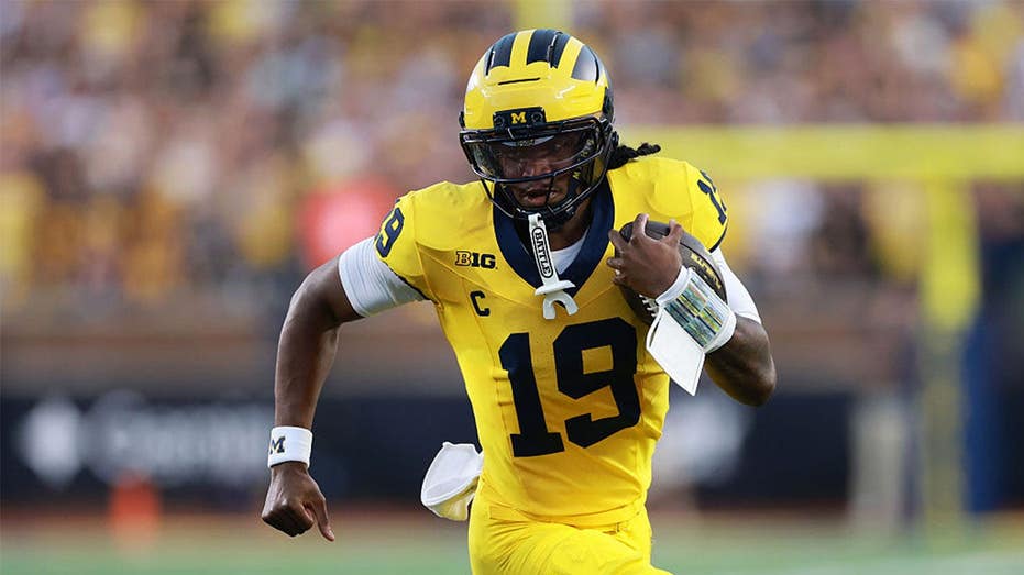 Michigan coach says Bryce Underwood is Wolverines quarterback for 'right now' after near disaster in opener