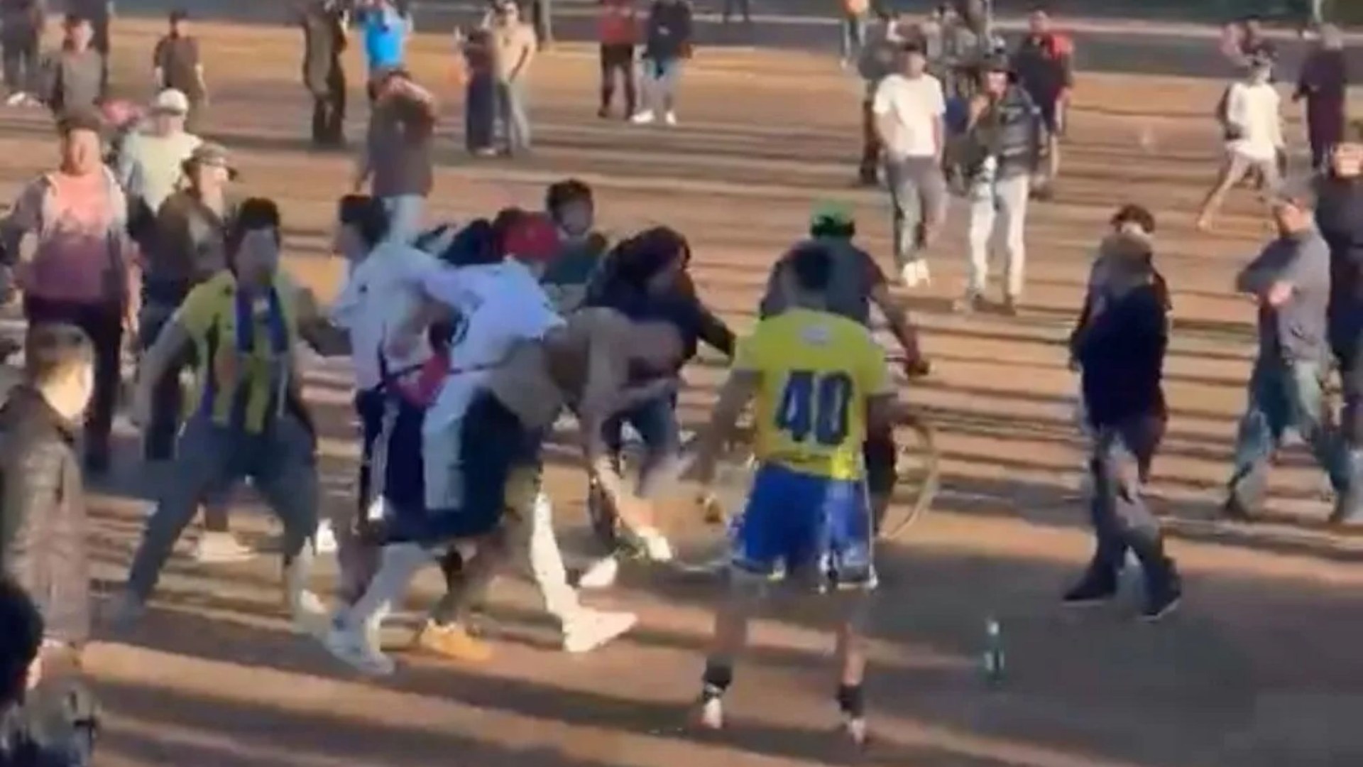 Moment mass brawl erupts at Sunday League football match with players throwing punches as game descends into violence