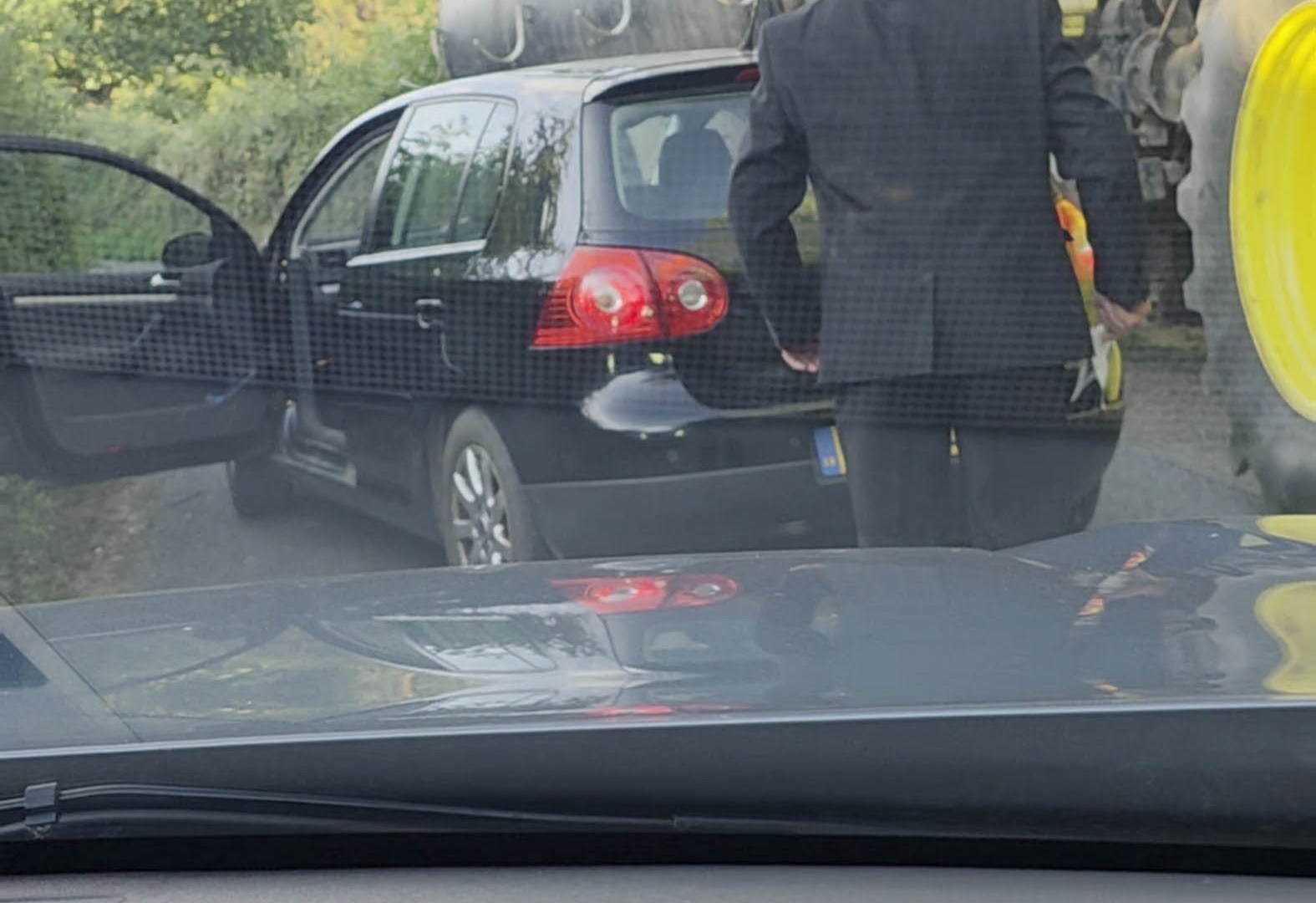 Moment raging motorist lashes out at tractor driver in 10-MINUTE row over who should reverse on narrow country lane